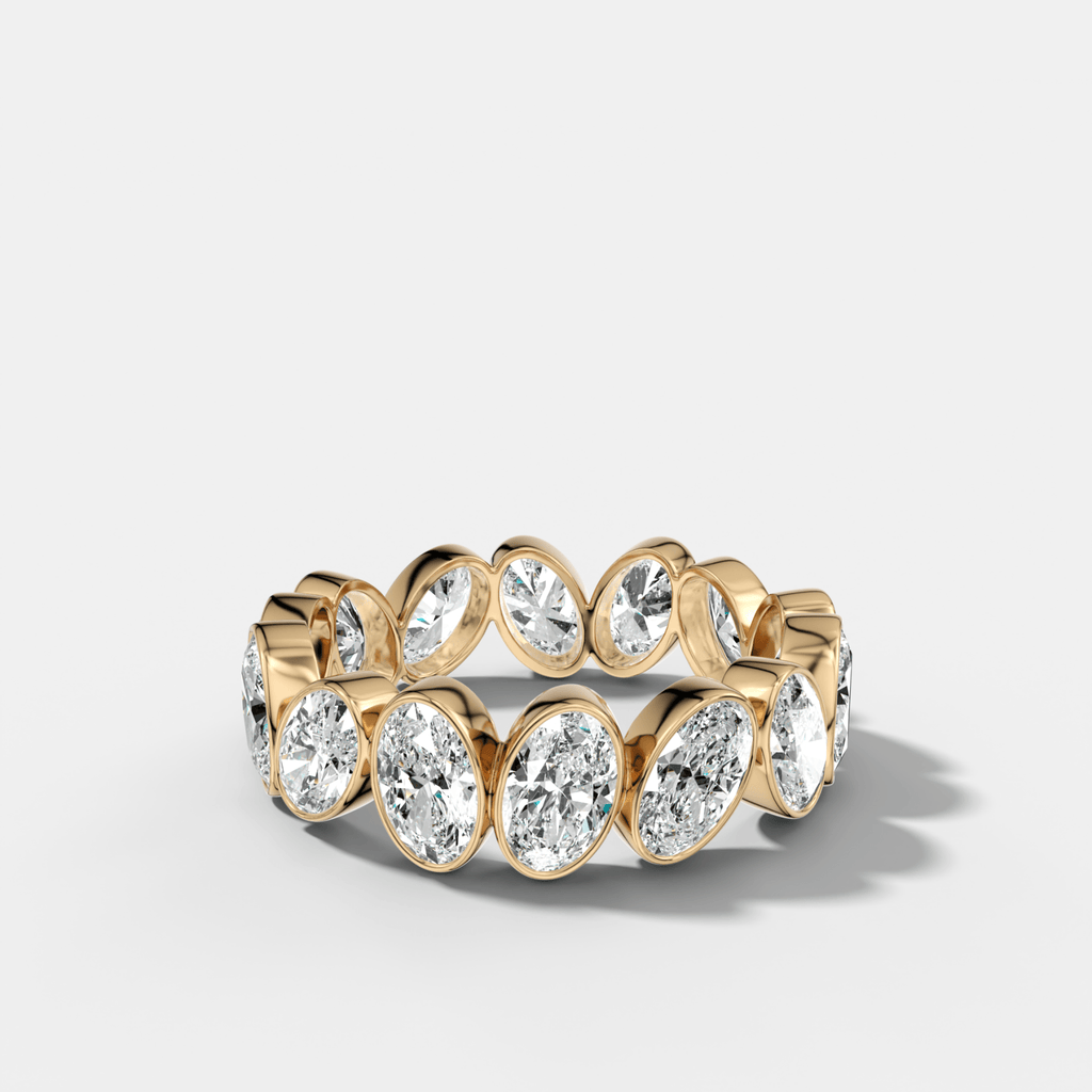 Tilted Bezel Set Eternity Band with Oval Cuts