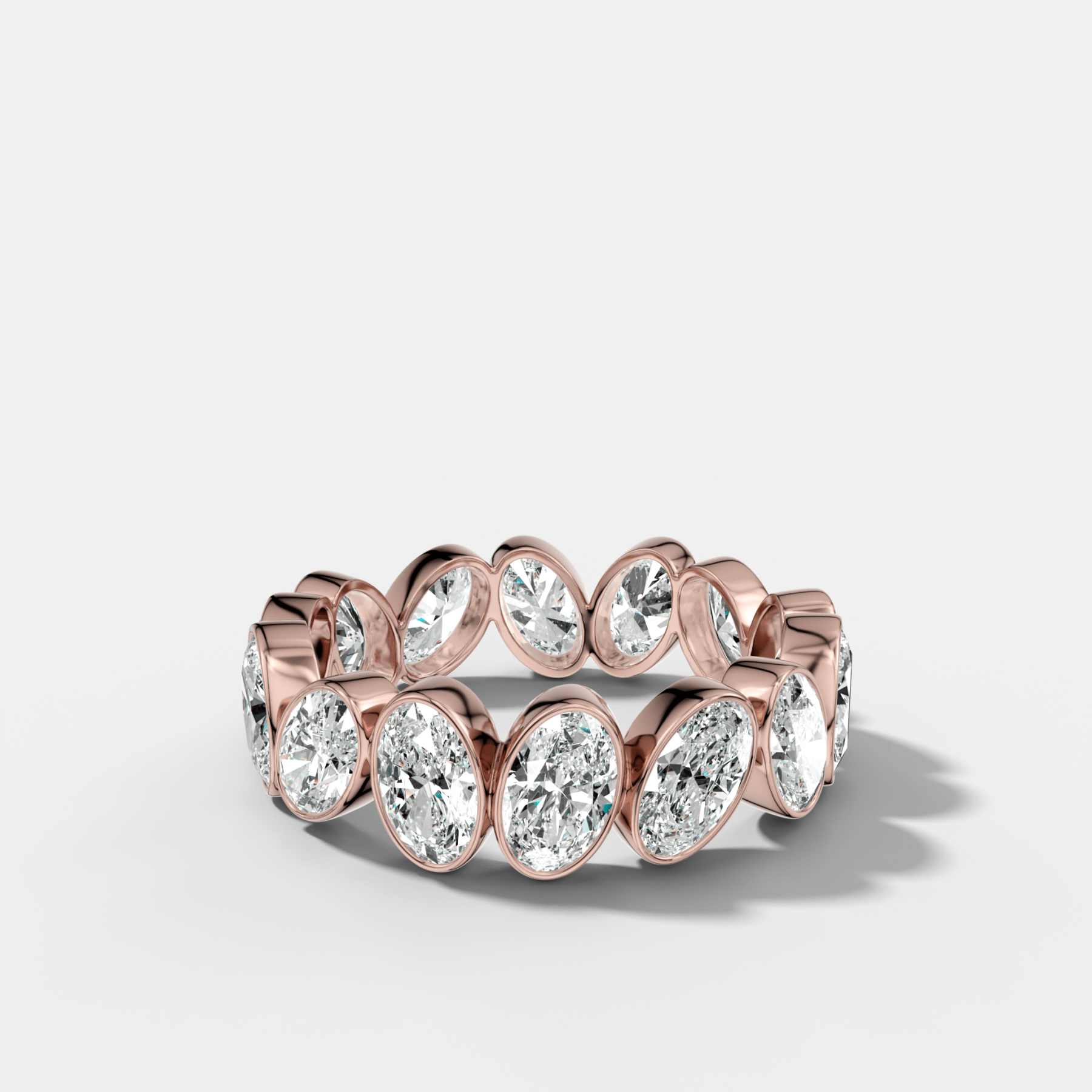 Tilted Bezel Set Eternity Band with Oval Cuts