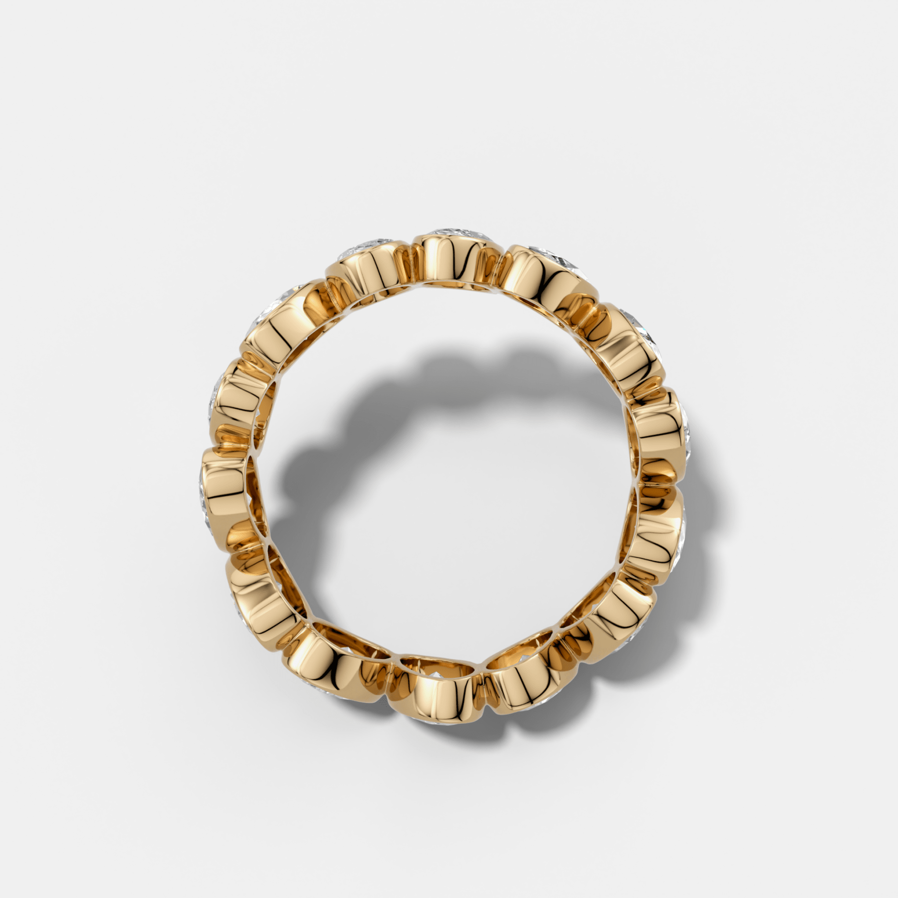 Tilted Bezel Set Eternity Band with Oval Cuts
