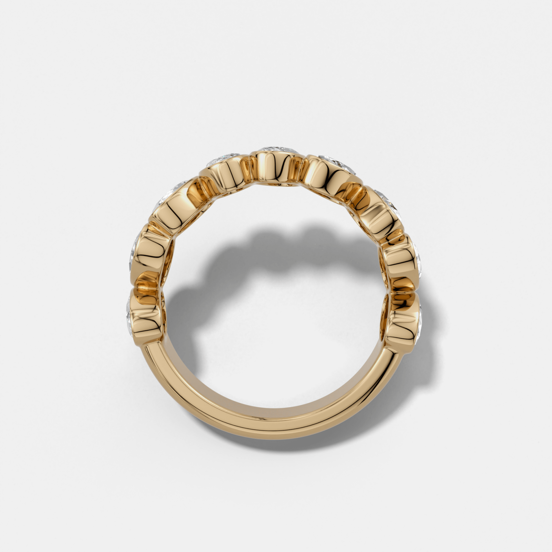 Tilted Bezel Set Wedding Band with Oval Cuts