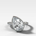 Tilted Penumbra Bezel Set Engagement Ring with 4.43ct Lab Grown Pear Cut Diamond