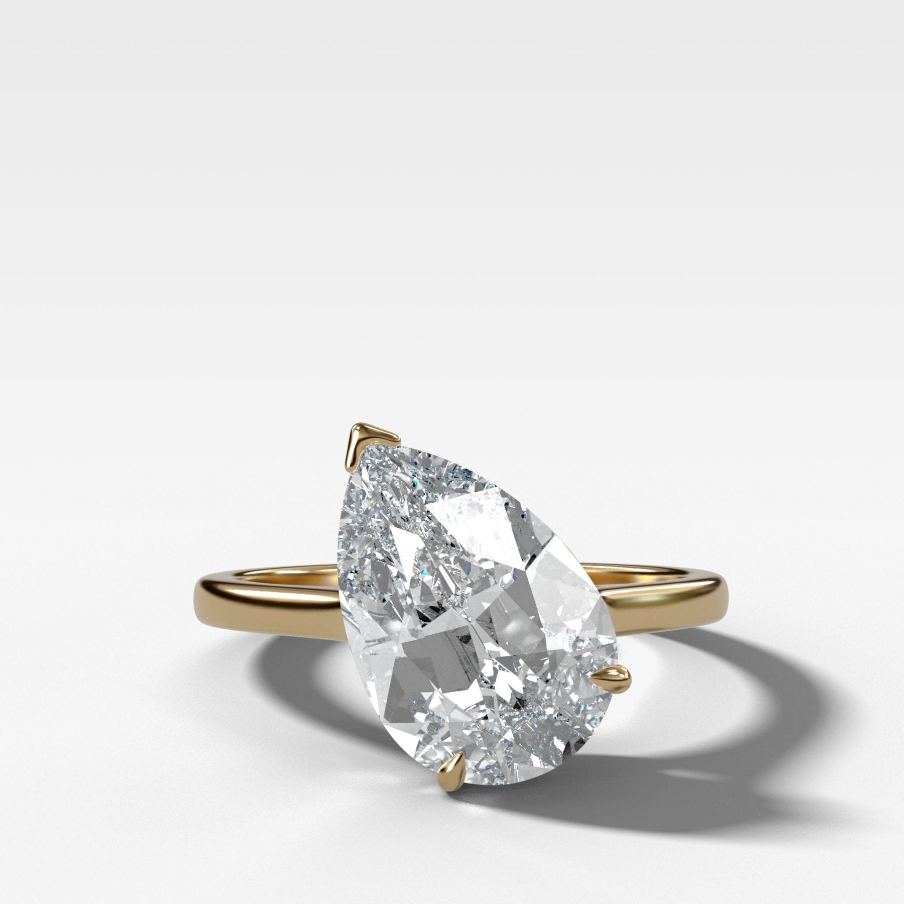 Tilted Thin + Simple Engagement Ring with 3.00ct Lab Grown Pear Cut Diamond