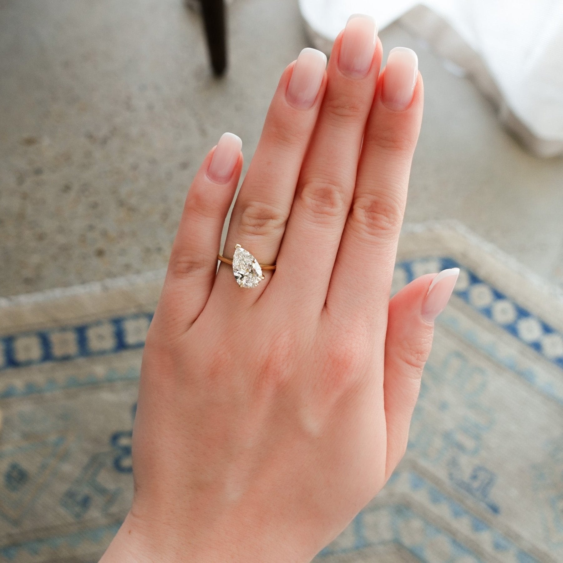 Tilted Thin + Simple Engagement Ring with 3.00ct Lab Grown Pear Cut Diamond