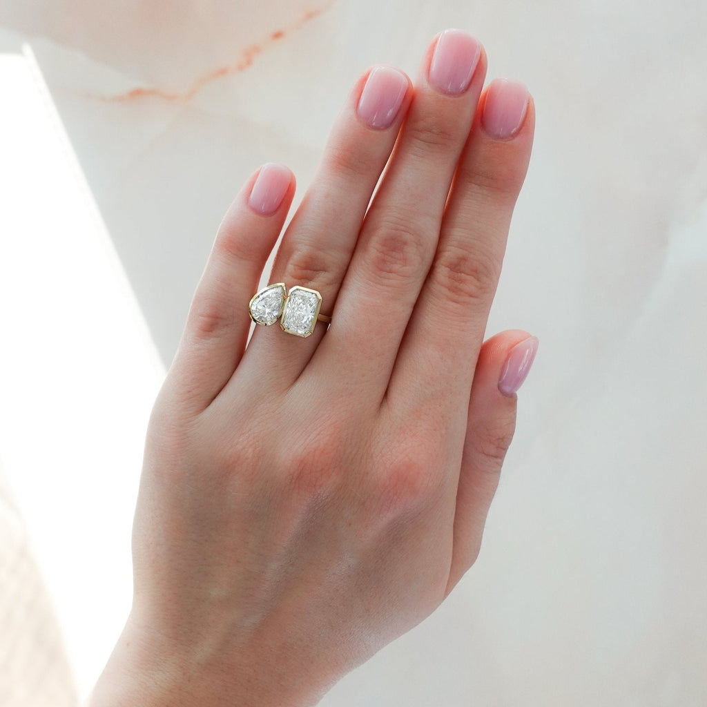 Toi et Moi Bezel Engagement Ring with Pear and Elongated Radiant Cut Diamonds