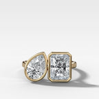 Toi et Moi Bezel Engagement Ring with Pear and Elongated Radiant Cut Diamonds