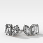 Toi et Moi Bezel Set Diamond Studs with Emerald and Marquise Cuts