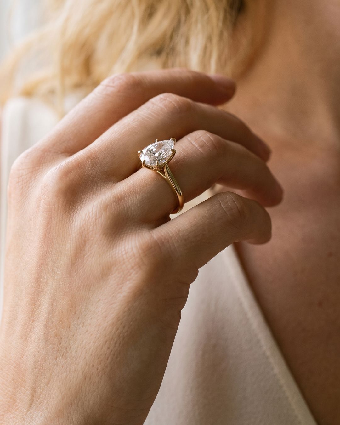Tulip Basket Cathedral Engagement Ring with Pear Cut Diamond