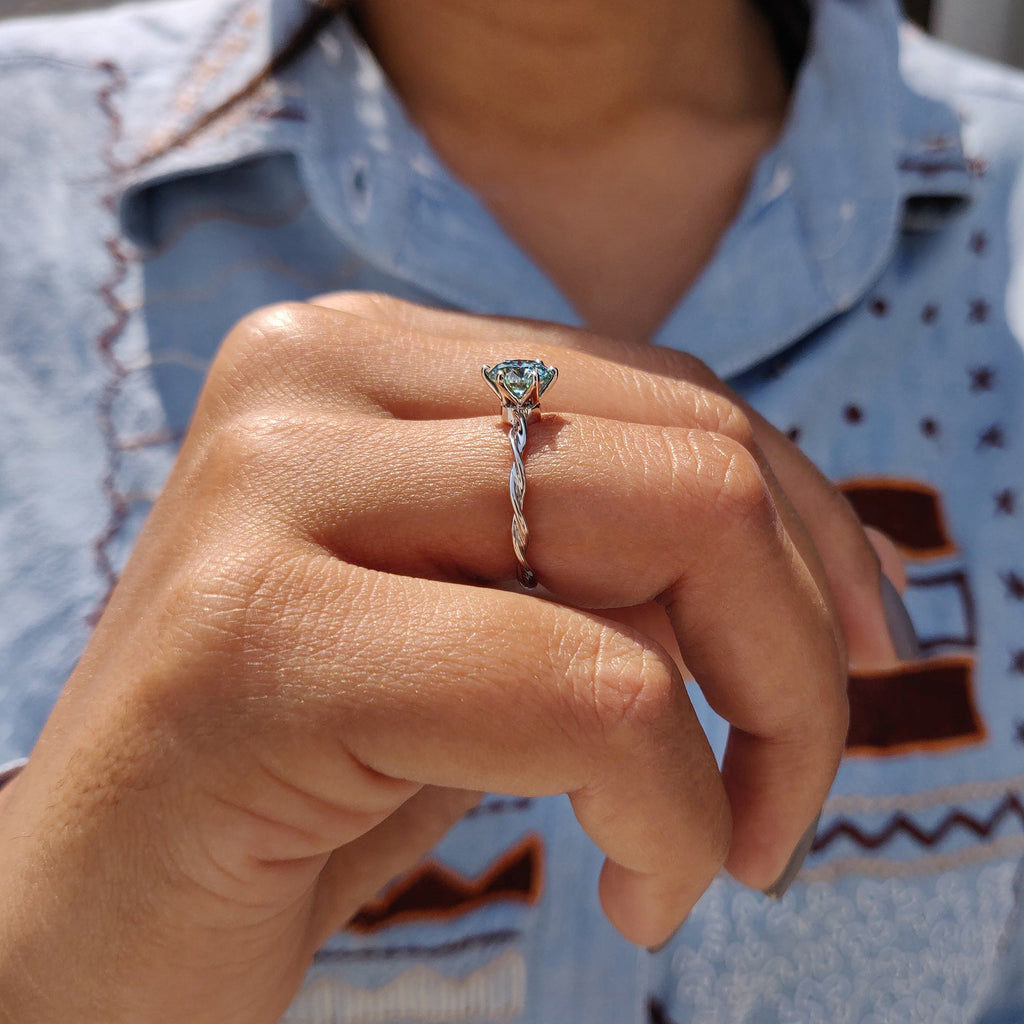 Round Solitaire Engagement Ring With Twisted Setting