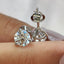 Round Diamond Stud Earrings In White Gold